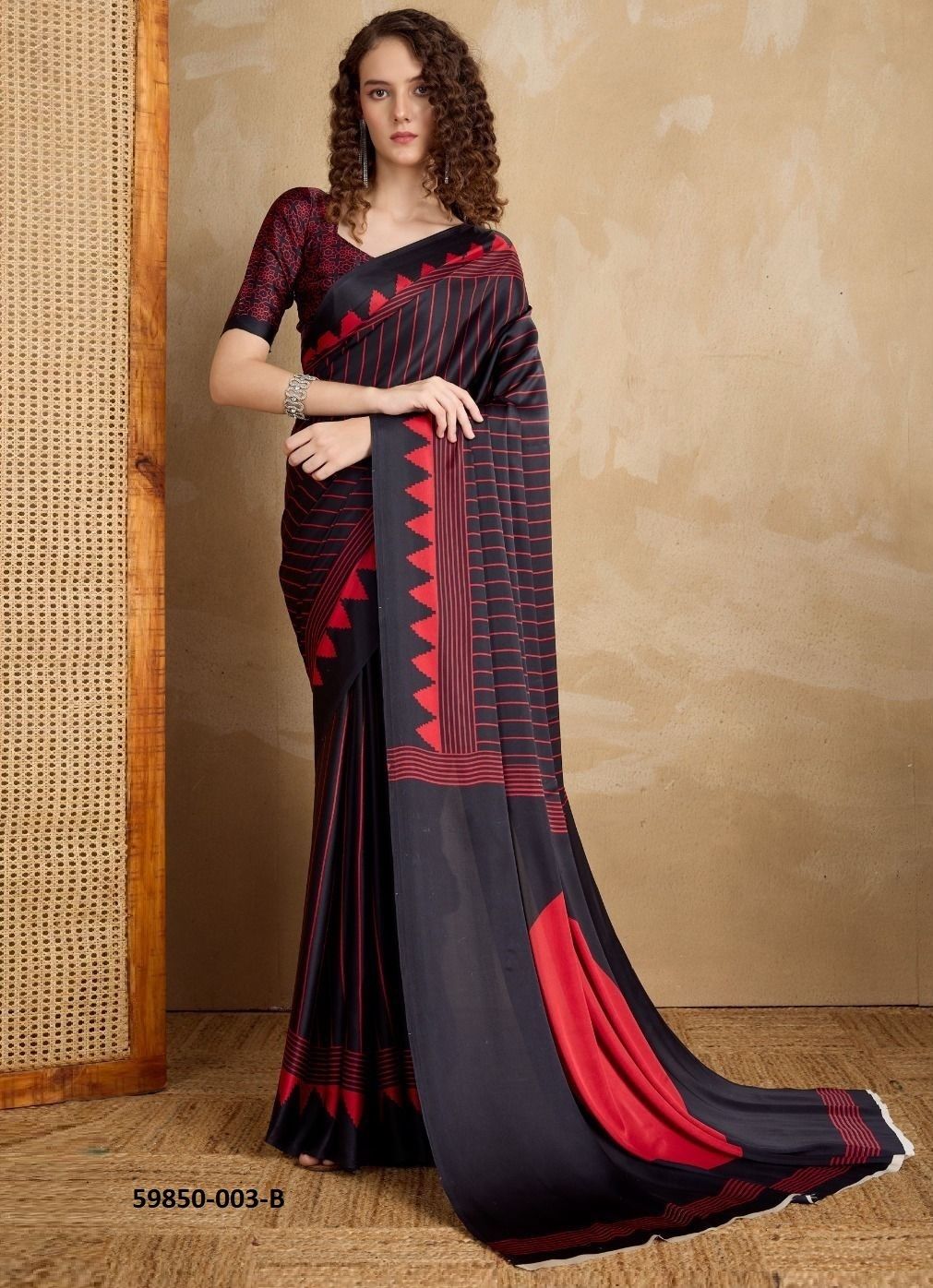 PURE AJRAKH PRINT 3 - Catalog # 59850 (Set of 12 Sarees) by Brand RAJTEX FABRICS