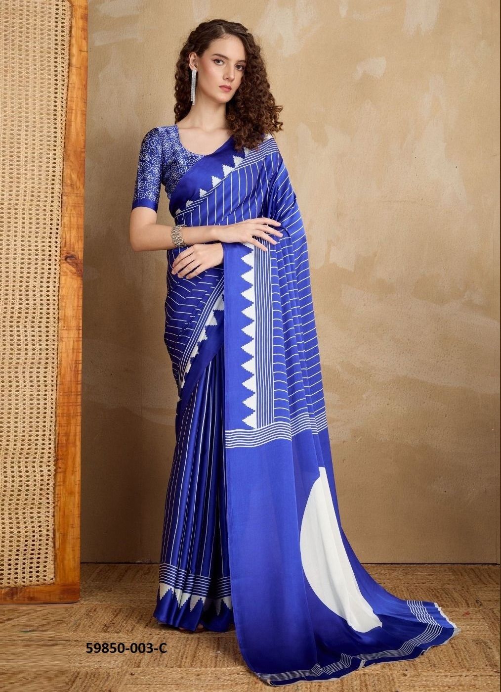 PURE AJRAKH PRINT 3 - Catalog # 59850 (Set of 12 Sarees) by Brand RAJTEX FABRICS