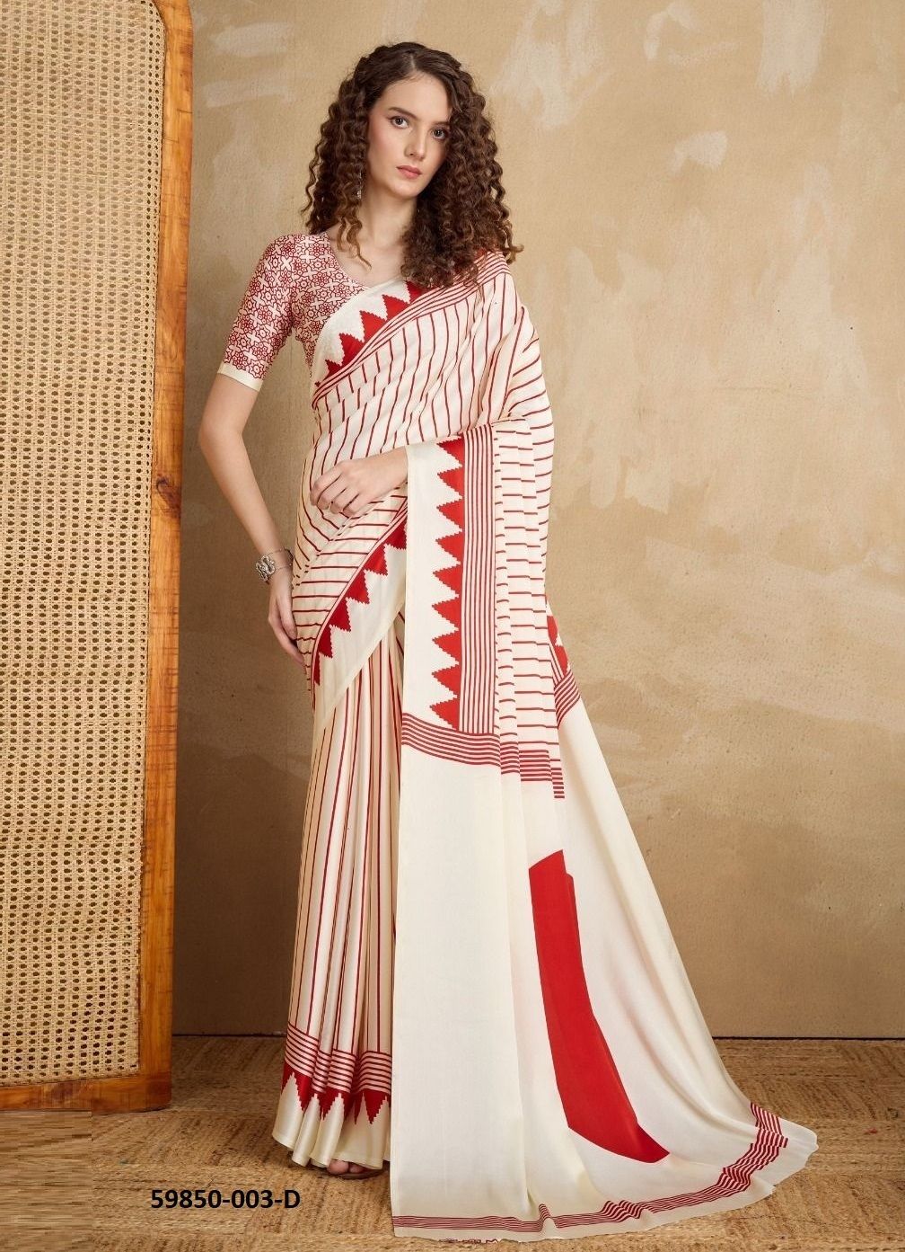 PURE AJRAKH PRINT 3 - Catalog # 59850 (Set of 12 Sarees) by Brand RAJTEX FABRICS