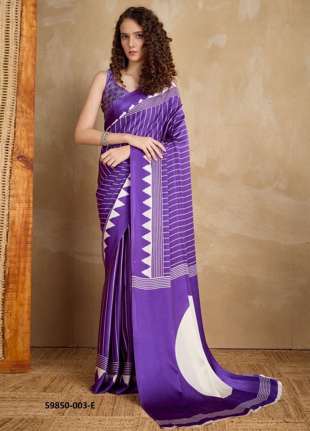 PURE AJRAKH PRINT 3 - Catalog # 59850 (Set of 12 Sarees) by Brand RAJTEX FABRICS
