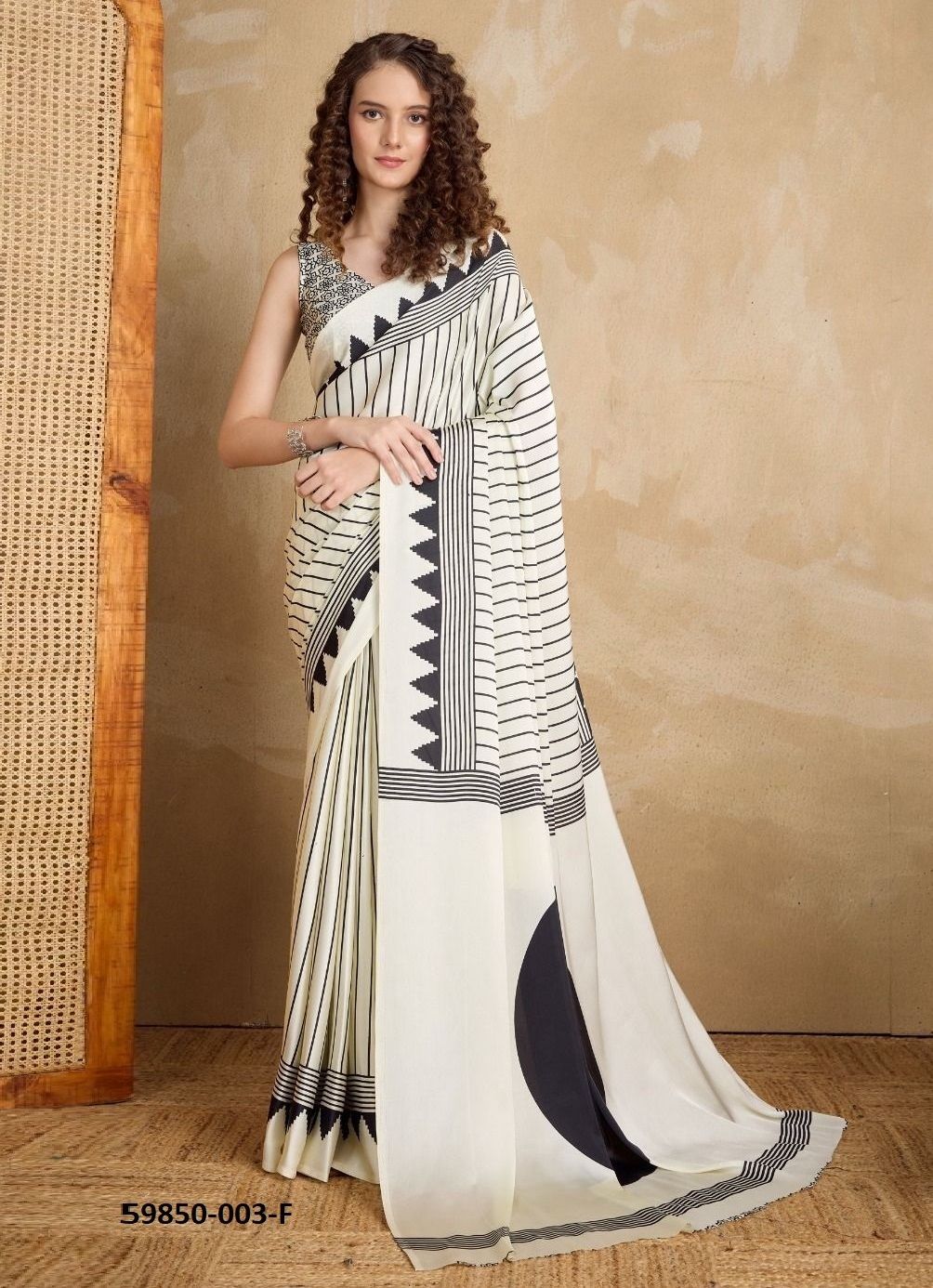 PURE AJRAKH PRINT 3 - Catalog # 59850 (Set of 12 Sarees) by Brand RAJTEX FABRICS