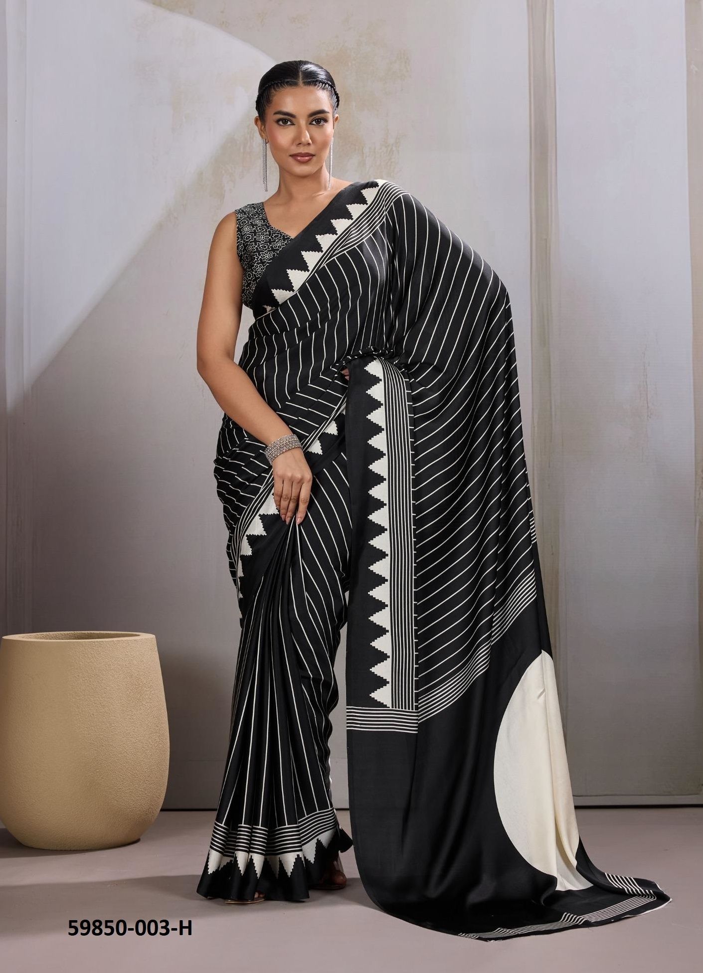 PURE AJRAKH PRINT 3 - Catalog # 59850 (Set of 12 Sarees) by Brand RAJTEX FABRICS