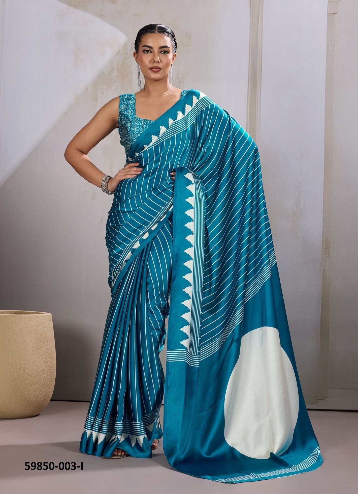 PURE AJRAKH PRINT 3 - Catalog # 59850 (Set of 12 Sarees) by Brand RAJTEX FABRICS