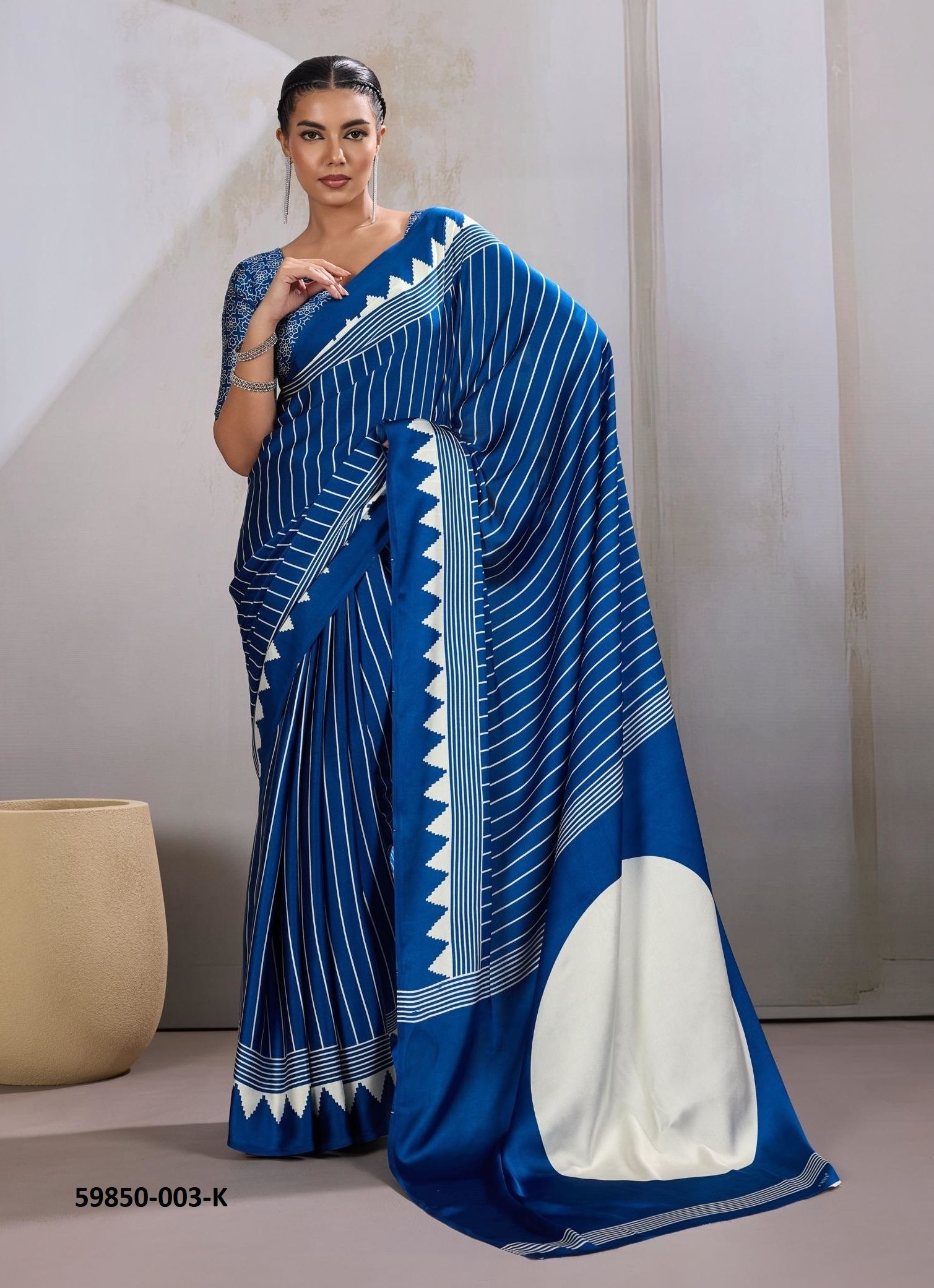 PURE AJRAKH PRINT 3 - Catalog # 59850 (Set of 12 Sarees) by Brand RAJTEX FABRICS