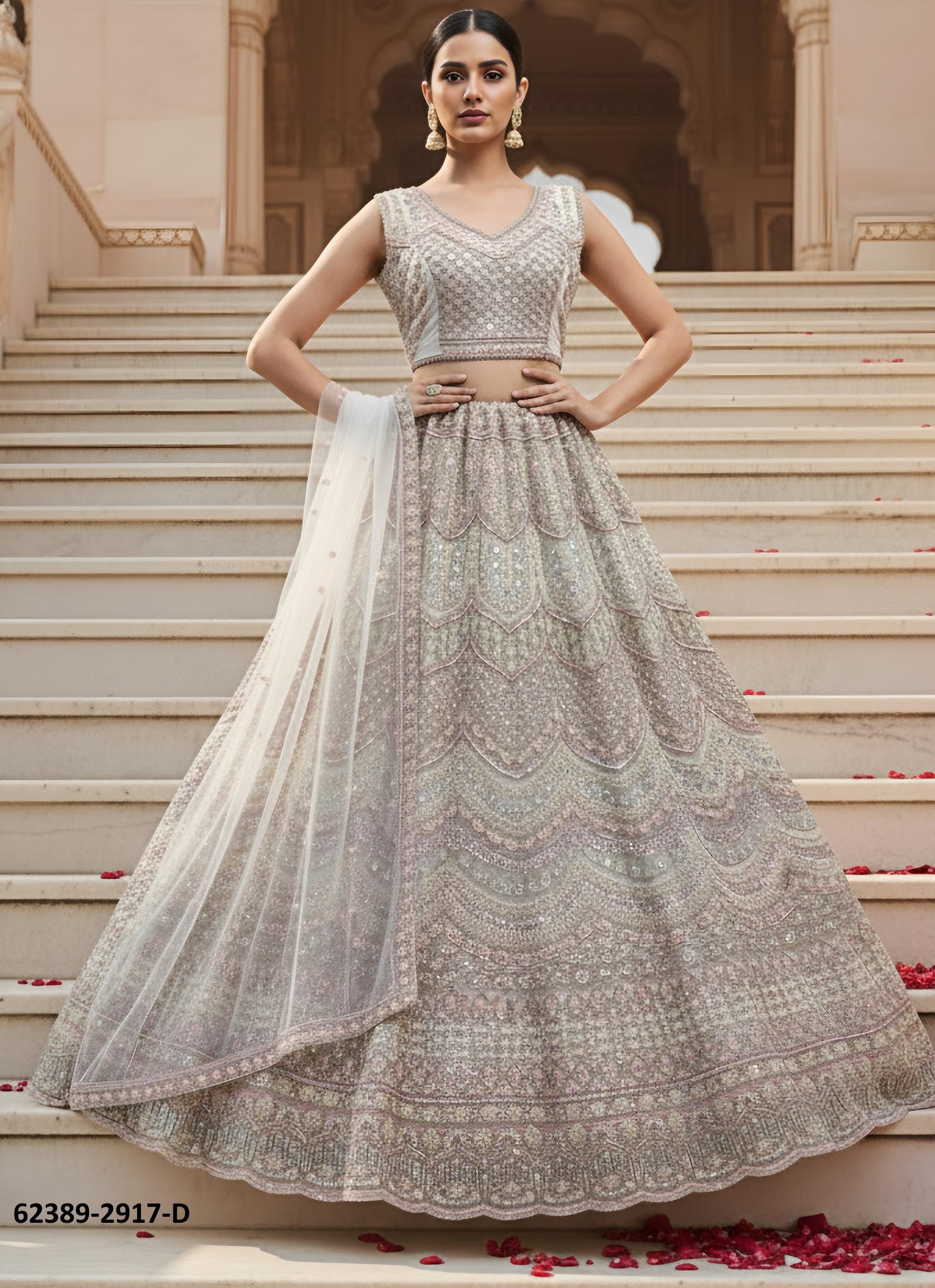 SERIES 2917-2921 - Catalog # 62389 (Set of 16 Semi-Stitched Lehengas) by Jagraasa