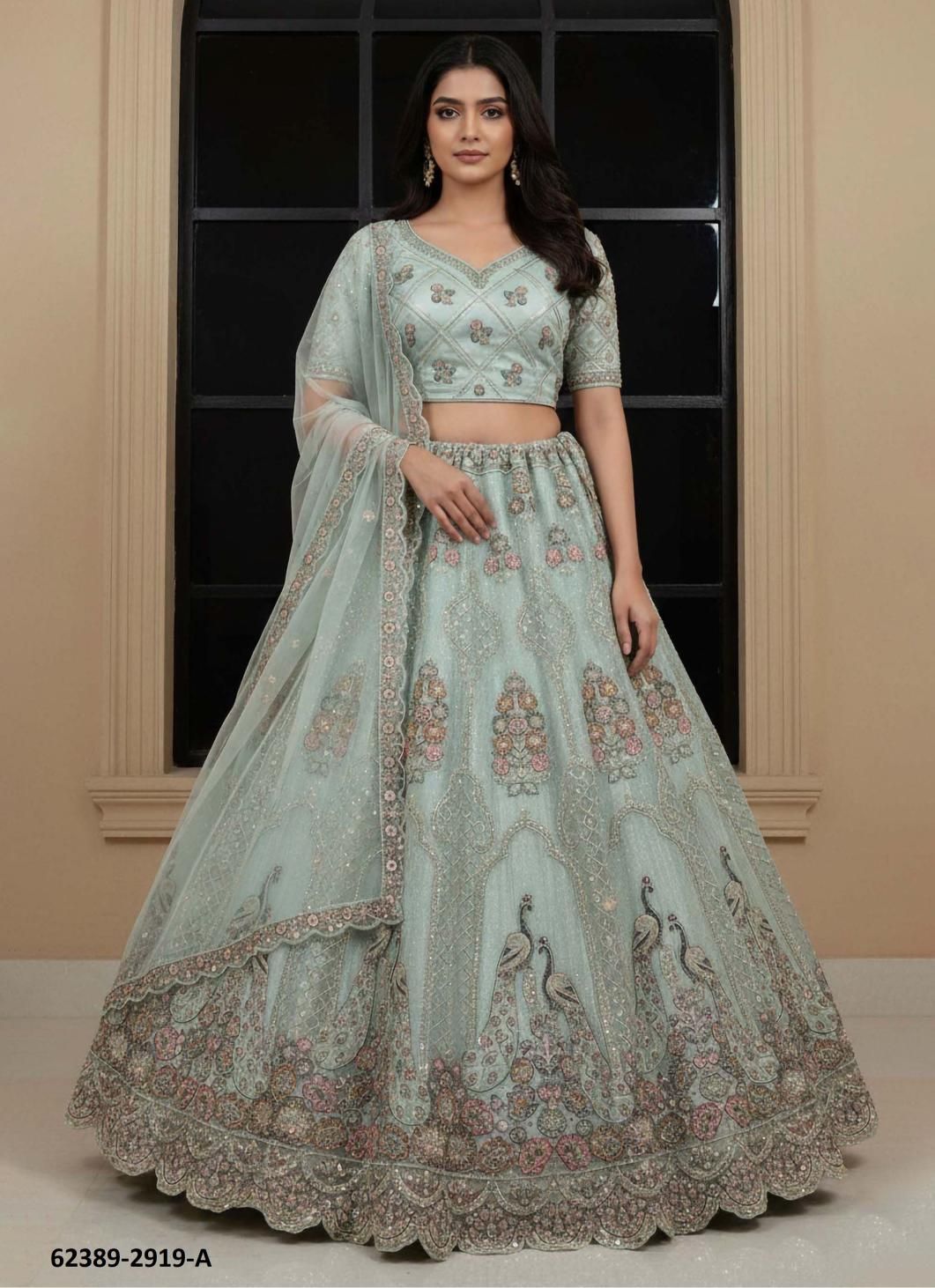 SERIES 2917-2921 - Catalog # 62389 (Set of 16 Semi-Stitched Lehengas) by Jagraasa