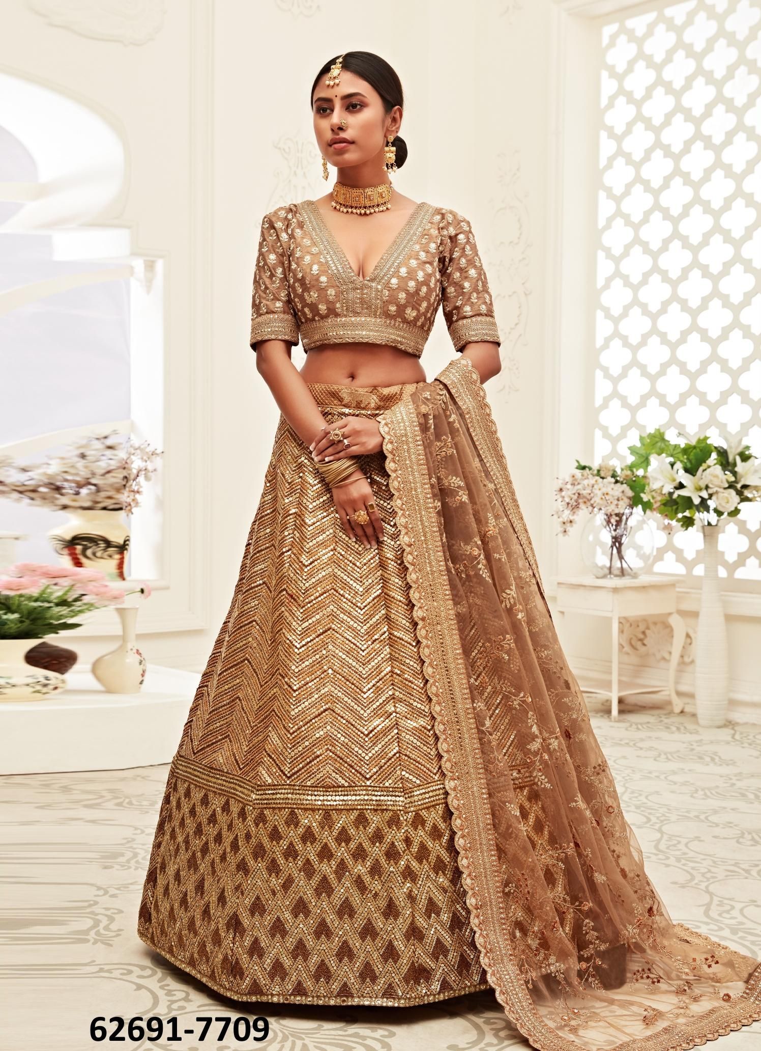 TRADITIONAL 2 - Catalog # 62691 (Set of 9 Semi-Stitched Lehengas) by Meheriya