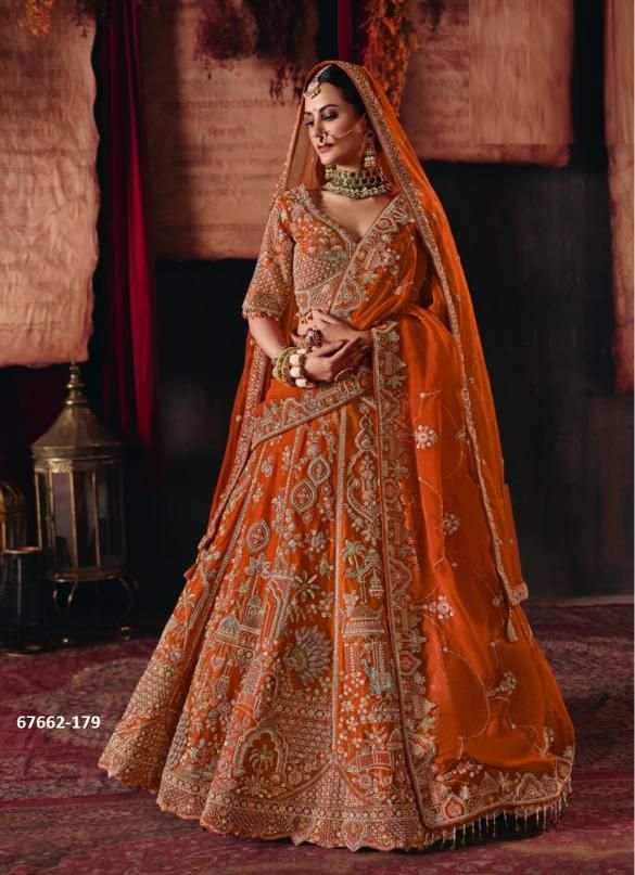 ANAR DANA BRIDAL EDIT - Catalog # 67662 (Set of 12 Readymade Lehengas) ANAR DANA BRIDAL EDIT - Catalog # 67662 (Set of 12 Readymade Lehengas)